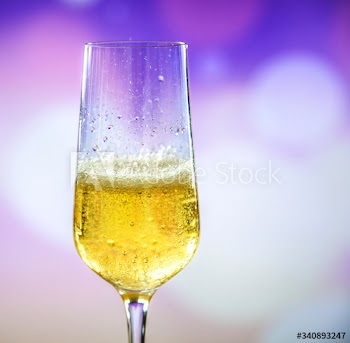 A glass of sparkling wine
