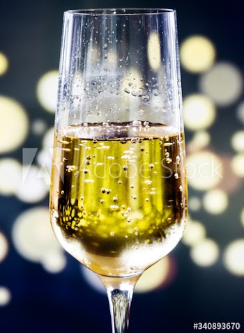 A glass of sparkling wine