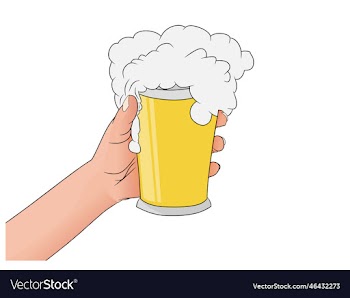 a hand holding a glass filled with