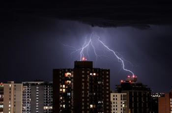 A Lightning Stroke In The Night Sky
