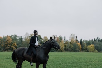 A Man Riding a Horse