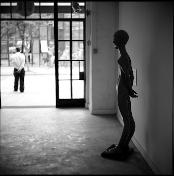 A Mannequin In Front Of Doorway