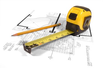 A measuring tape and a pencil over a construction drawing of a house (design and drawings by the submitter)