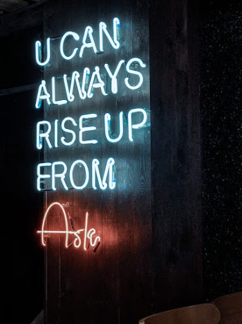 A Neon Lighted Statement Of Words