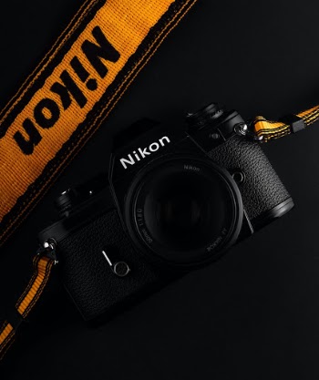A nikon em, introduced in 1979, Is a simple nikon f mount SLR camera. I was designed to be marketed to the growing market of new women photographers then entering the SLR buyer’s market.