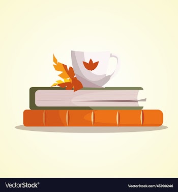 a pair of books lying in stack and white cup
