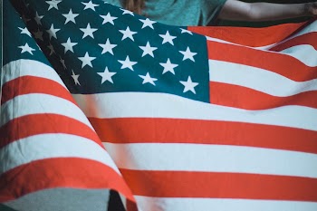 A person holding an American | Free Photo - rawpixel
