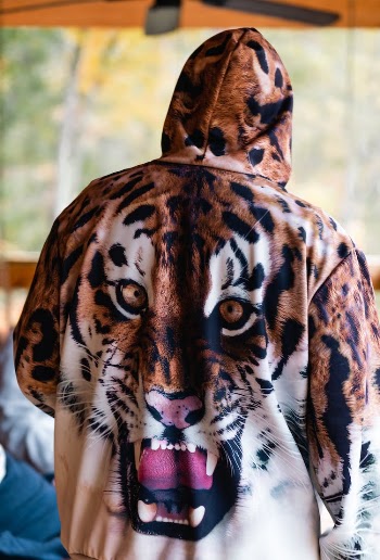 A Person Wearing Tiger Print Hoodie
