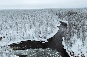 A river in winter at Oulanka National Park, Finland.