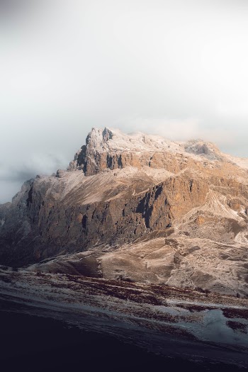 A Rocky Mountain under a Cloudy Sky