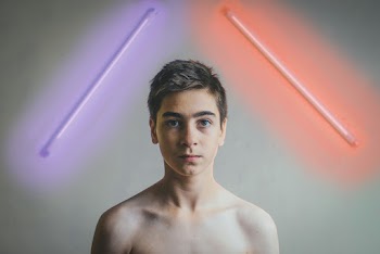 A Shirtless Young Man