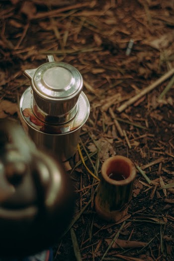 A Silver Pot On The Ground