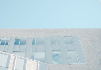 A stairwell in a building seen through its windows