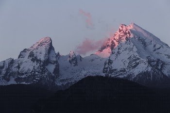 A tall mountain summit illuminated | Free Photo - rawpixel