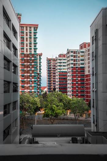A very clear contrast between the office and home as I look out towards the direction of the houses. Home to many Singaporeans