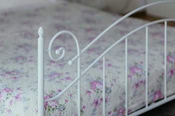 A vintage white bed 3