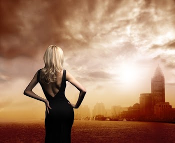 a woman and a view of a city