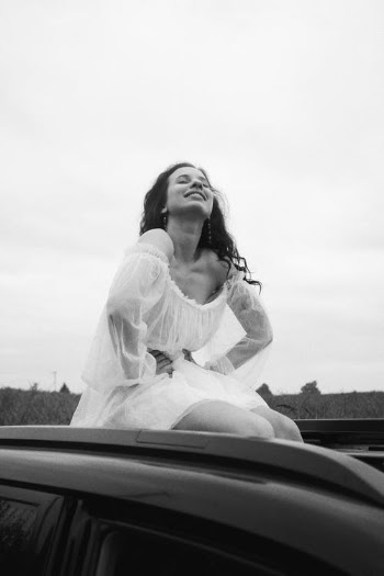 A Woman in a White Dress · Free Stock Photo