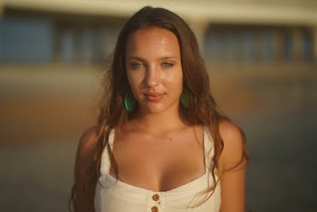 A woman in a white top