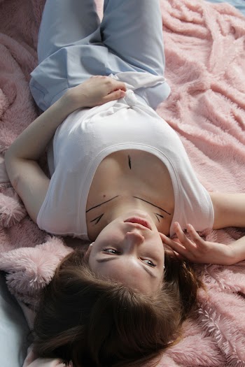 A woman lying on a bed