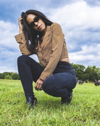 A Woman On A Squat Position 