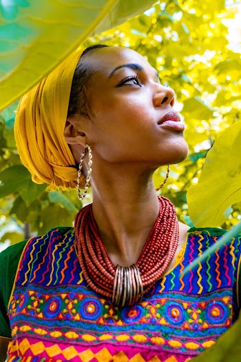 A Woman Posing By Looking Up
