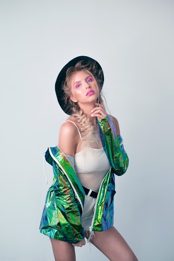 A Woman Posing In A Casual Wear