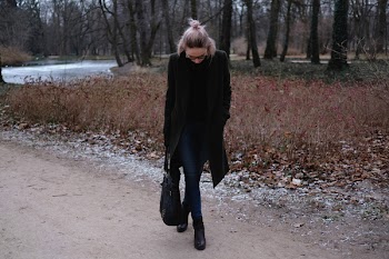 A woman posing in the park