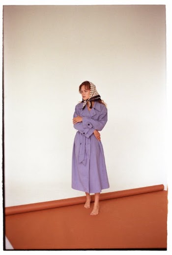 A Woman Wearing a Purple Dress Standing Barefoot · Free Stock Photo