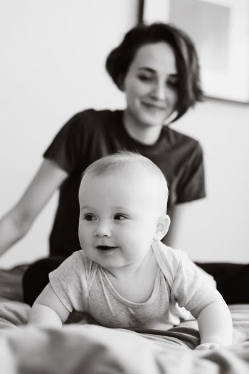 A Woman With Her Baby  · Free Stock Photo