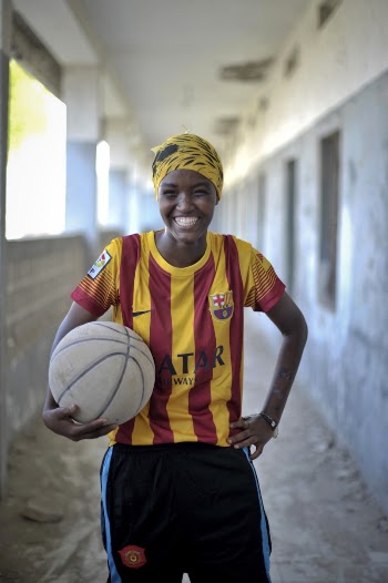 A young Somali girl holds | Free Photo - rawpixel