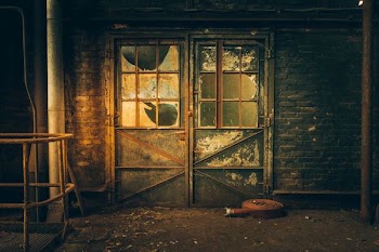 abandoned concrete building door close