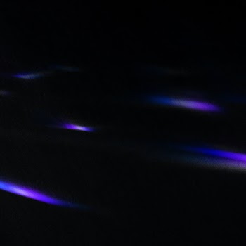 Abstract dark tone lens flare wallpaper