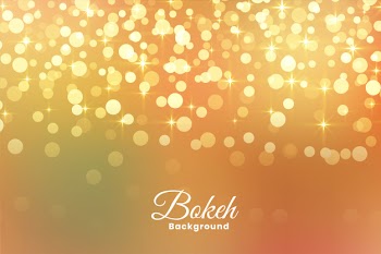 Abstract light shimmer golden background Free Vector