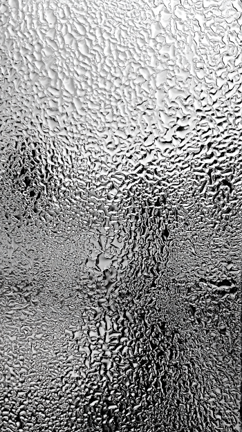 Abstract Macro Rainwater Droplets on Textured Glass