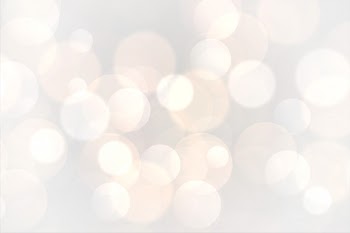 Abstract white bokeh glowing lights background Free Vector