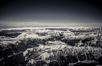 aerial and grayscale photography of glacier mountains