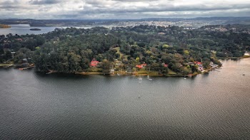 Aerial Photo Of  A Water front  Community With Lush Vegetation