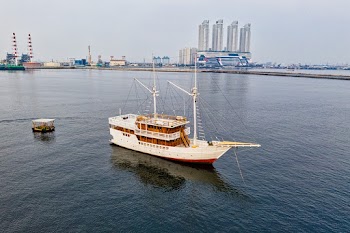 Aerial Photo of a White Boat on Body of Water