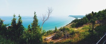 Aerial Photo of Beach and Mountain