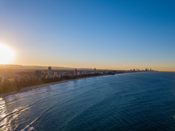 Aerial Photo Of City Beside Body Of Water