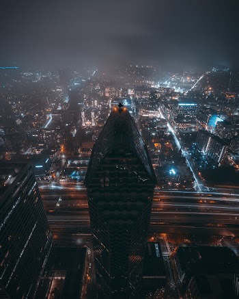Aerial Photo of City Buildings at Night