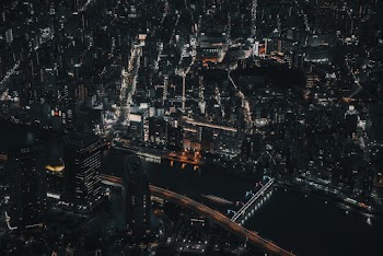 Aerial Photo of City Buildings During Night