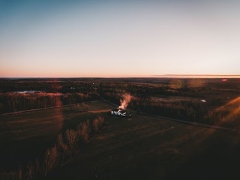 aerial photo of flame near brown grass at daytime