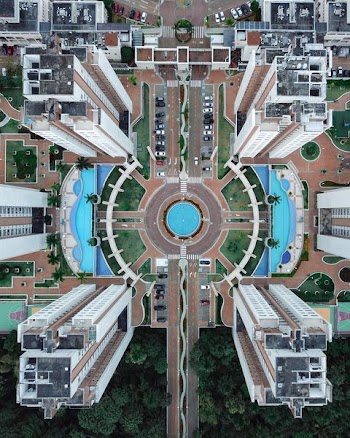 aerial photo of four-building structure
