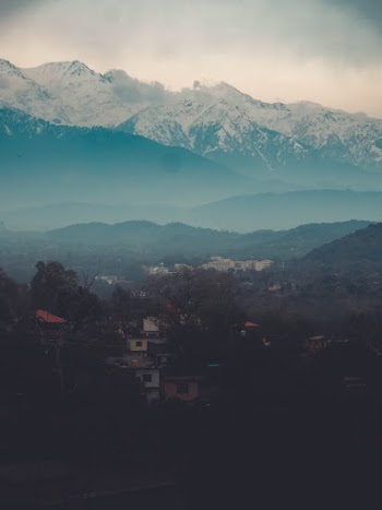 Aerial Photo of Houses Near Mountains