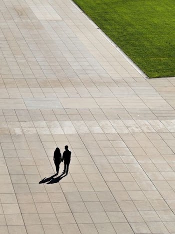 aerial photo of man and woman walking