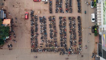 Aerial Photo of Motorcycles on Parking Space