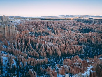 aerial photo of mountain under blue sky