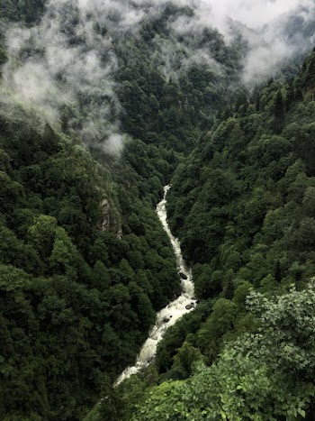Aerial Photo of River Between Green Mountain